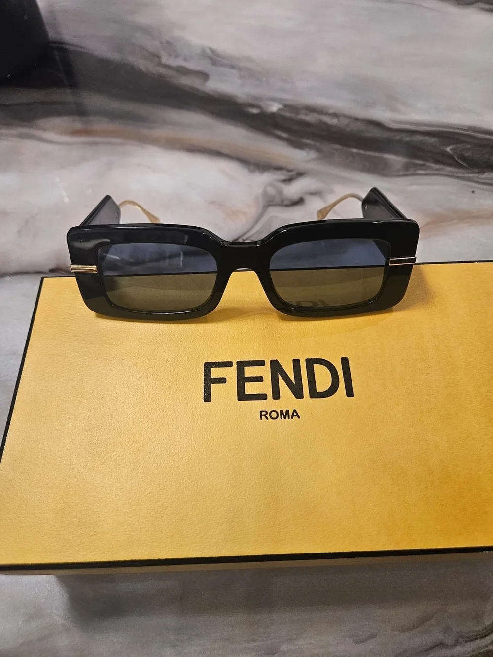 Fendi Black Sunglasses with Gold Temples and Dark Lenses